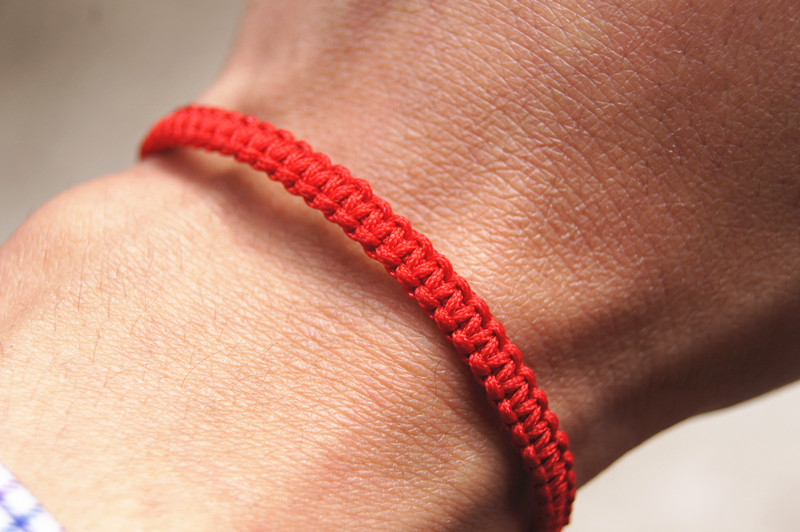 Free delivery - pure hand woven yellow * red * dark green, flat knot - charm bracelet.