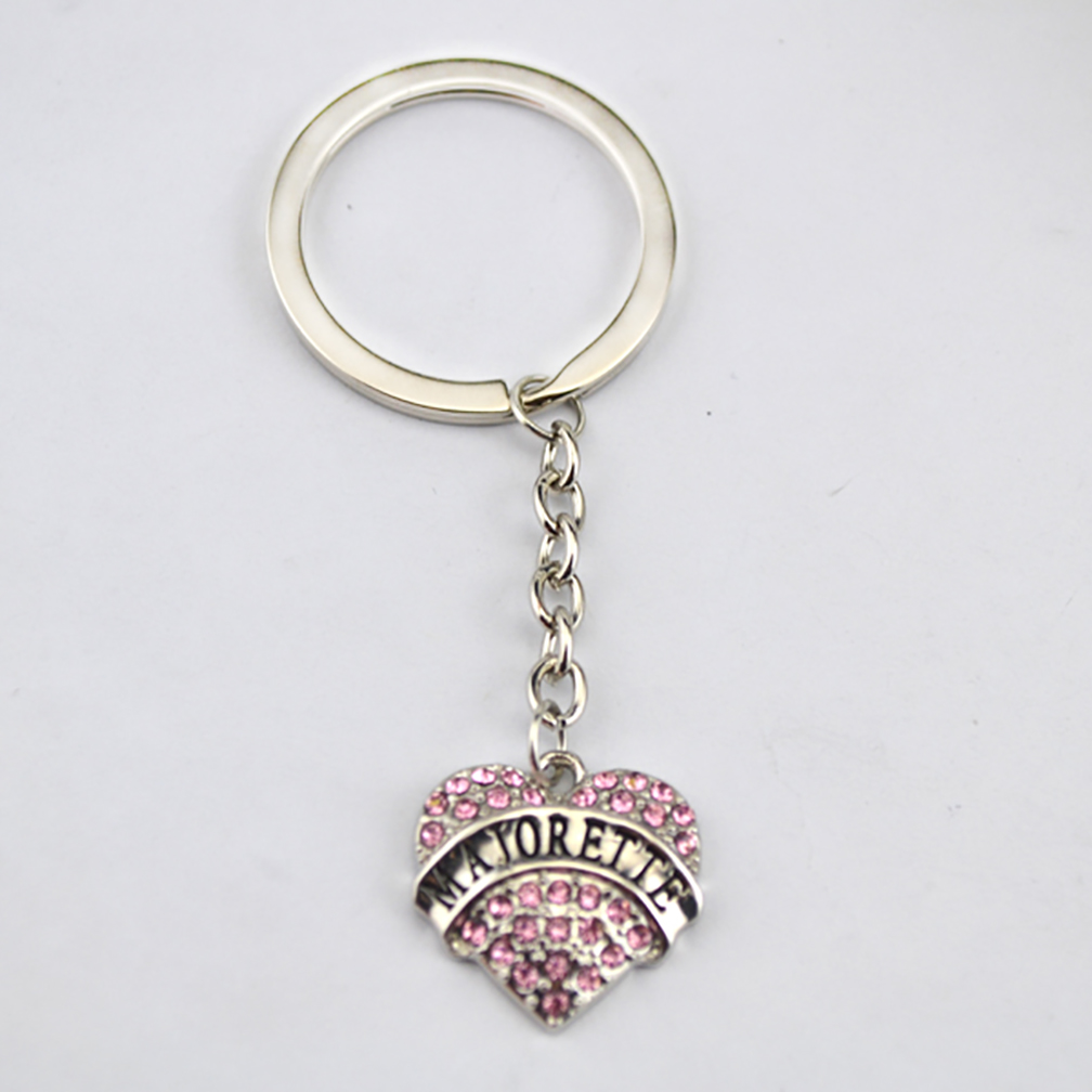 Drop Shipping Three Kinds Of Design Rhodium Plated Zinc Studded With Sparkling Crystals MAJORETTE Heart Pendent Charm Key Chain
Drop Shipping Three Kinds Of Design Rhodium Plated Zinc Studded With Sparkling Crystals MAJORETTE Heart Pendent Charm Key Chain