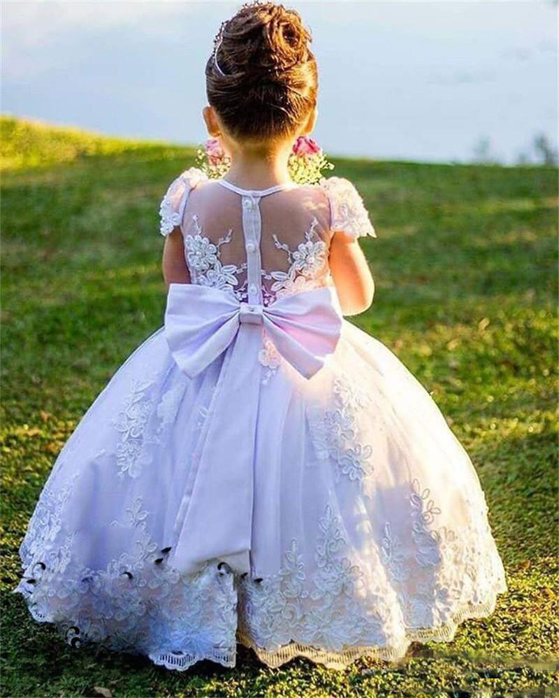 Lovely Flower Girls Dresses For Weddings Cap Sleeves Ball Gown Girls Pageant Dress Back Sheer Lace Appliques Bow First Communion Dresses