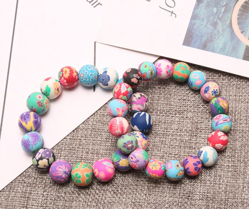 Fashion Colorful handmade Bohemian beaded bracelets Floral soft clay elastic bracelet For Women Girls National jewelry wholesale free ship
Fashion Colorful handmade Bohemian beaded bracelets Floral soft clay elastic bracelet For Women Girls National jewelry wholesale free ship