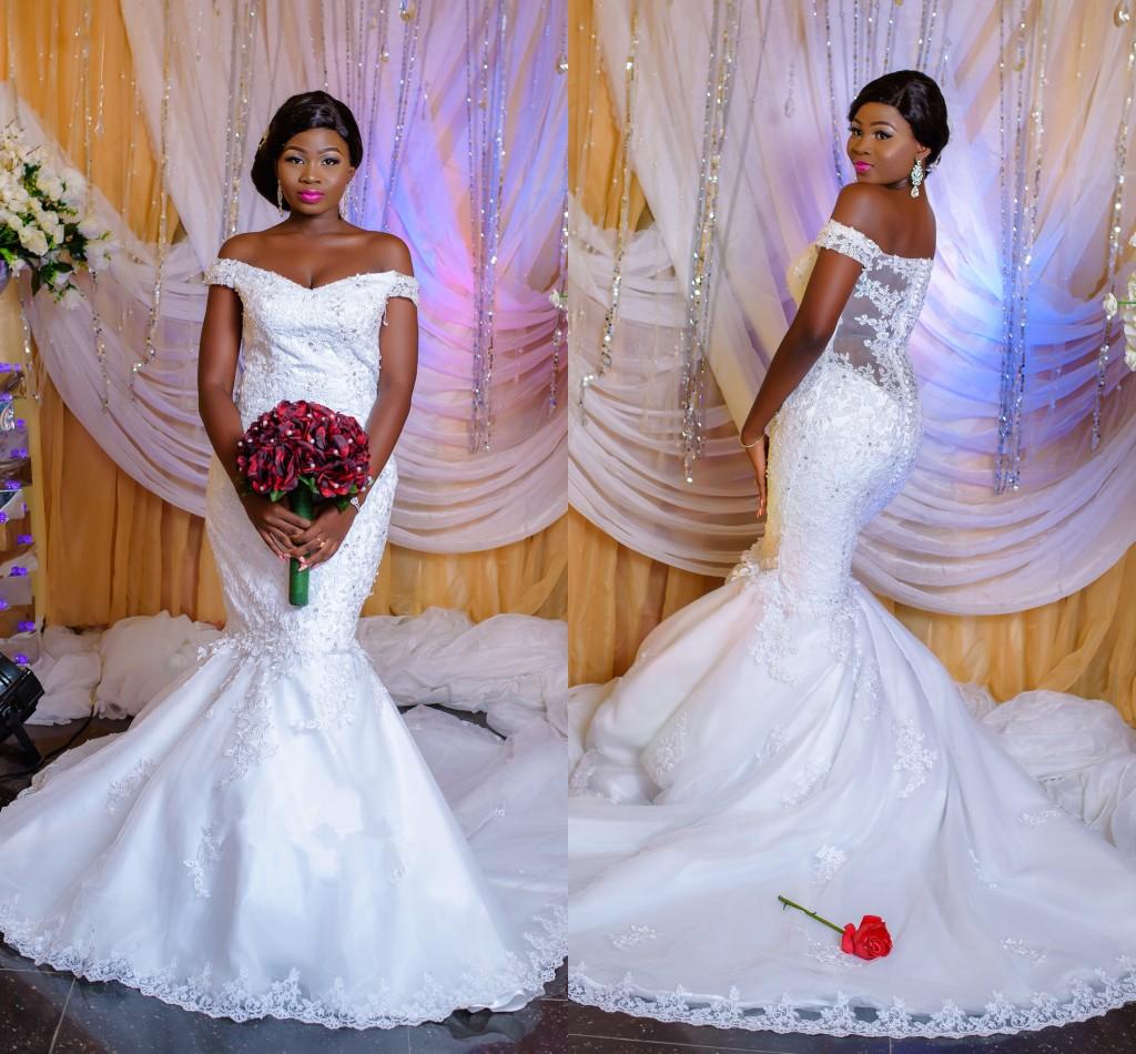 2018 New African Mermaid Wedding Dresses Off Shoulder Cap Sleeves Lace Appliques Beaded Vestido Button Back Sheath Long Custom Bridal Gowns, White
2018 New African Mermaid Wedding Dresses Off Shoulder Cap Sleeves Lace Appliques Beaded Vestido Button Back Sheath Long Custom Bridal Gowns, White