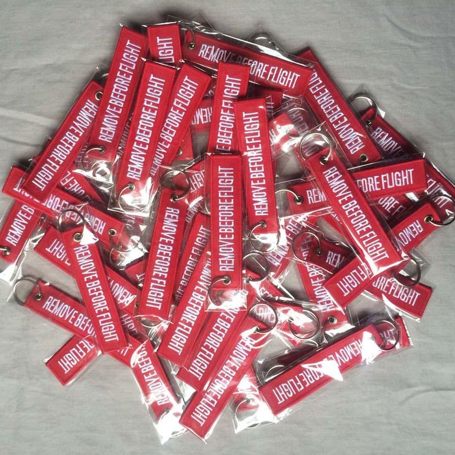 6 Colors Polyester Fabric REMOVE BEFORE FLIGHT Embroidery Aviation Flight Words Key Chain Originality Gift Keychains 500pcs KKA1419
6 Colors Polyester Fabric REMOVE BEFORE FLIGHT Embroidery Aviation Flight Words Key Chain Originality Gift Keychains 500pcs KKA1419