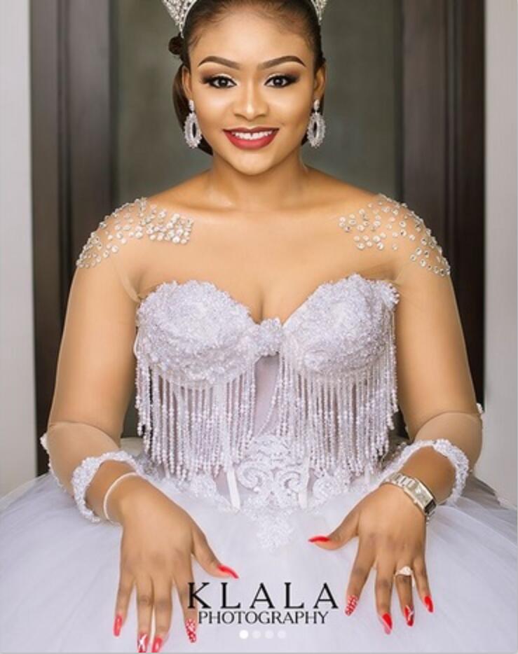 African Wedding Dresses Sheer Jewel Neck Luxury Beaded Tassel Ball Gown Long Sleeve Bridal Gowns Sexy Back Plus Size Wedding Dress