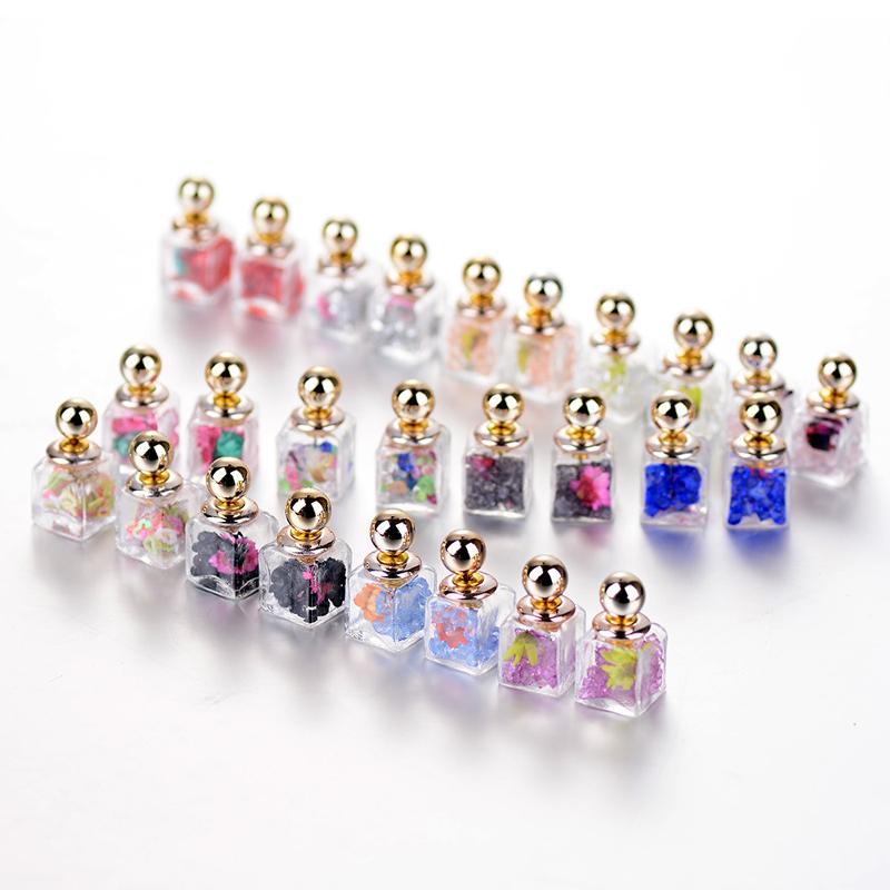 perfume bottle ear stud dry flower glass bottle earrings Double side Crystal quicksand earrings fashion jewelry
perfume bottle ear stud dry flower glass bottle earrings Double side Crystal quicksand earrings fashion jewelry