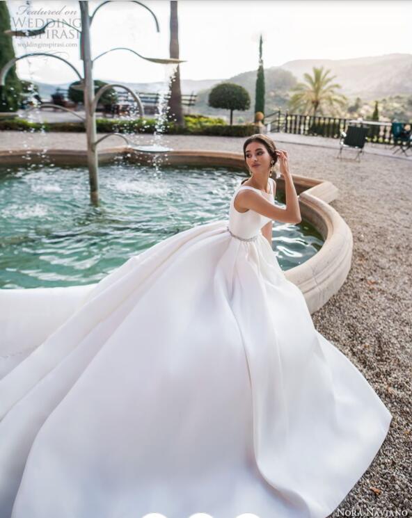 Cheap Satin Wedding Dresses Sexy Backless Jewel Neck Sweep Train Beach Wedding Gowns Belt Crystal Beaded Plus Size Bohemian Bridal Dress