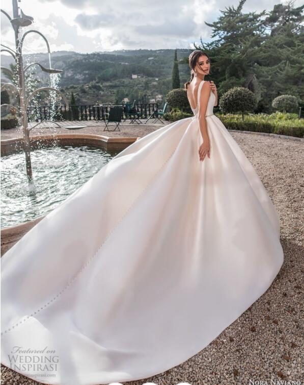 Cheap Satin Wedding Dresses Sexy Backless Jewel Neck Sweep Train Beach Wedding Gowns Belt Crystal Beaded Plus Size Bohemian Bridal Dress
