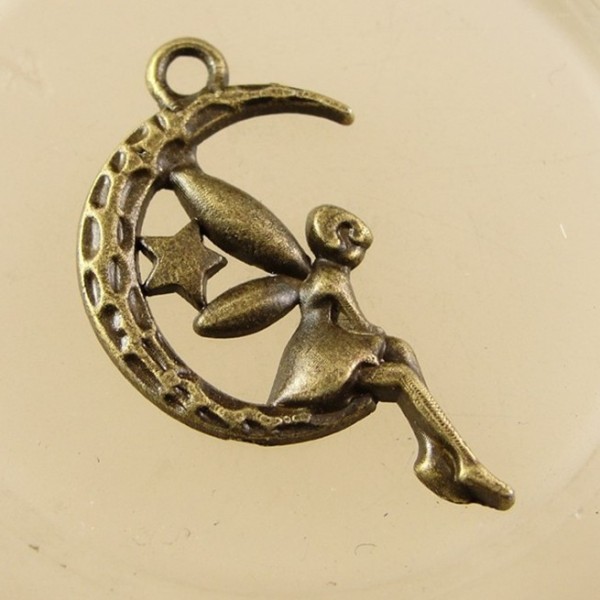 500 pcs/ lot Charms fairy angel moon star pendnat 25*16mm antique silver and bronze for option
500 pcs/ lot Charms fairy angel moon star pendnat 25*16mm antique silver and bronze for option
