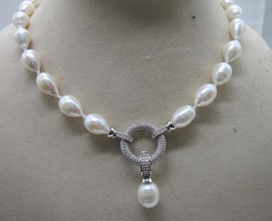 Hand knotted natural 45cm 11-13mm white natural rice freshwater pearl necklace pendant elegant clasp, Silver
Hand knotted natural 45cm 11-13mm white natural rice freshwater pearl necklace pendant elegant clasp, Silver