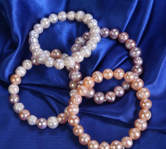 100% natural Freshwater Irregular Pearl Bracelet Beaded Strands Mixed order white / Pink / purple 8-12mm Stretch Elastic Bridal fashion jewelry
100% natural Freshwater Irregular Pearl Bracelet Beaded Strands Mixed order white / Pink / purple 8-12mm Stretch Elastic Bridal fashion jewelry