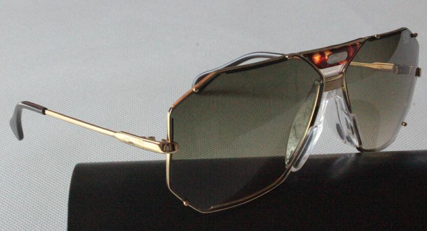 MOD905 VINTAGE SUNGLASSES GOLD FRAME GREEN LENSES BRAND NEW WITH ORIGINAL LEGENDS BOX, White;black
MOD905 VINTAGE SUNGLASSES GOLD FRAME GREEN LENSES BRAND NEW WITH ORIGINAL LEGENDS BOX, White;black