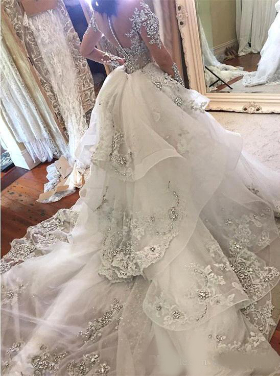 Luxury Arabic Wedding Dresses 2020 with Detachable Train High Neck Sheer Long Sleeves Crystal Appliqued Lace Cathedral Train Bridal Gowns