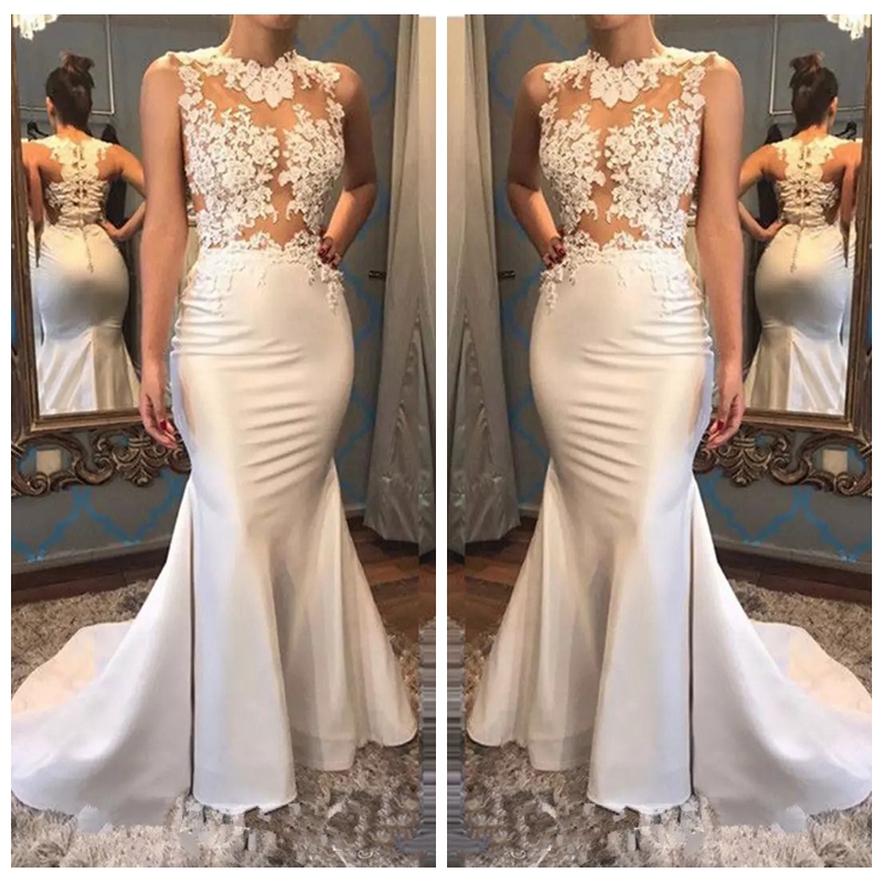 2018 Sheer Lace Appliques Mermaid Wedding Dresses Custom Jewel Sheer Neck Sleeveless Zipper Sweep Train Long Party Bridal Gowns, Same as image
2018 Sheer Lace Appliques Mermaid Wedding Dresses Custom Jewel Sheer Neck Sleeveless Zipper Sweep Train Long Party Bridal Gowns, Same as image