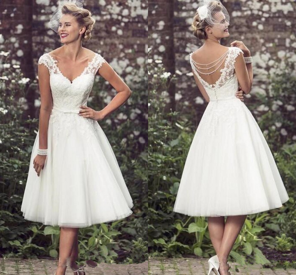 Elegant Tea Length Short Wedding Dresses 2018 Cap Sleeves Appliques Lace Wedding Gowns Tulle V Neck Short Bridal Gowns Cheap, Ivory
Elegant Tea Length Short Wedding Dresses 2018 Cap Sleeves Appliques Lace Wedding Gowns Tulle V Neck Short Bridal Gowns Cheap, Ivory