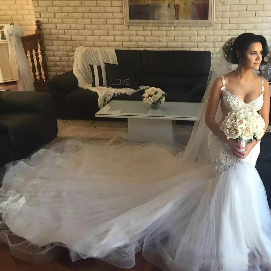 Princess Mermaid Wedding Dresses With Major Pearls Beads Sequins Appliques Sexy Backless Wedding Gowns Covered Buttons Luxury Bridal Dress