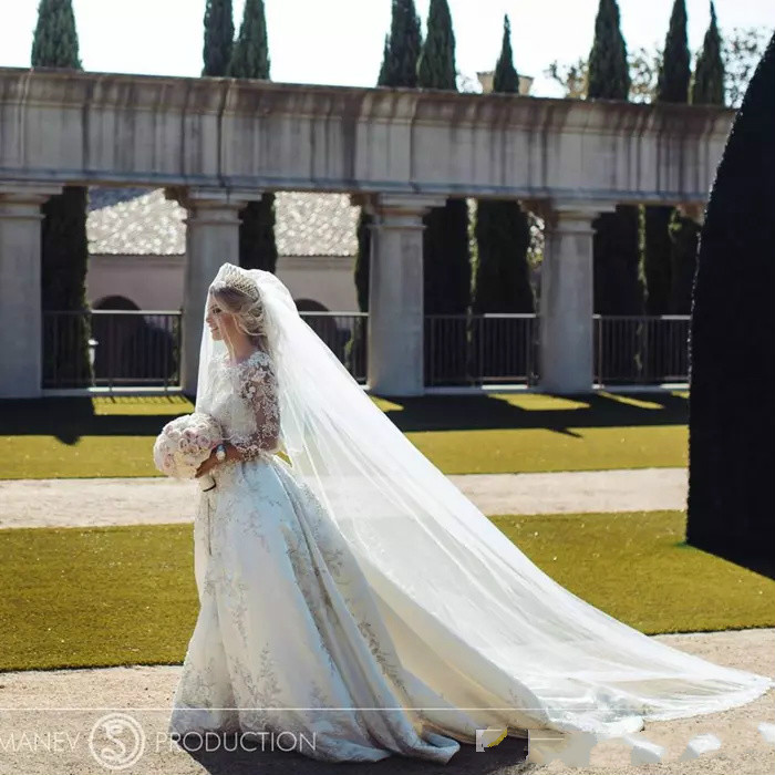Luxury Appliques Lace Dubai Long Sleeve Wedding Gowns With Detachable Train Jewel Neck Country Wedding Dress Satin Illusion Plus Size Bridal