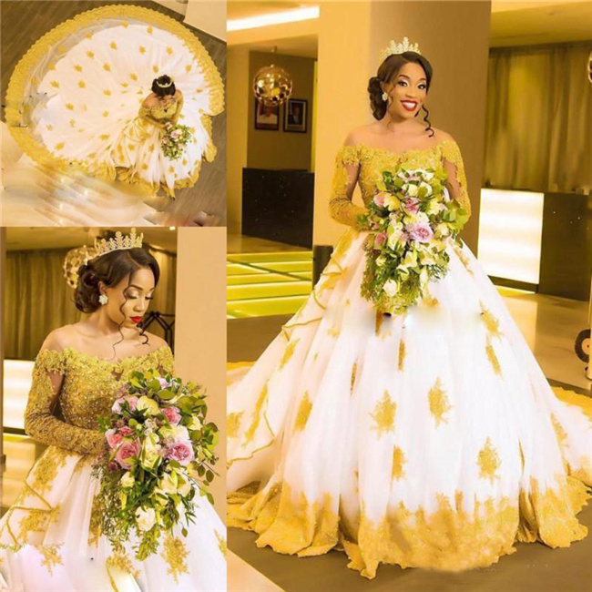 Beaded Lace Plus Size African Wedding Dresses Off The Shoulder Gold Appliques Ball Gown Wedding Dress with Long Sleeves Sheer Bridal Gowns, Same as image
Beaded Lace Plus Size African Wedding Dresses Off The Shoulder Gold Appliques Ball Gown Wedding Dress with Long Sleeves Sheer Bridal Gowns, Same as image