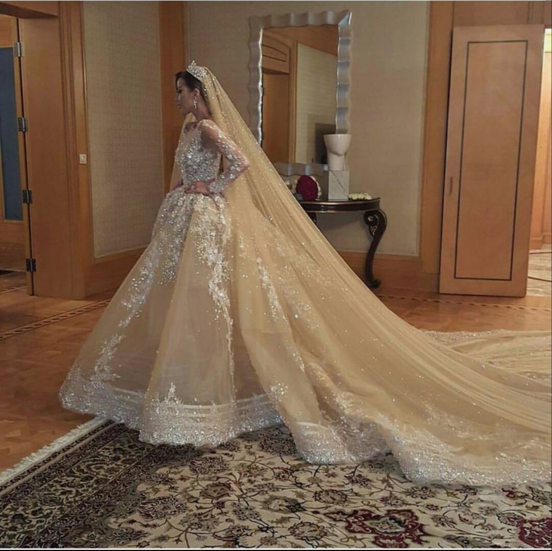 Royal Wedding Dresses With Appliqued Sequined A Line Champagne Floor Length Ball Gown Wedding Dress With Matching Wedding Veils Bridal Gowns