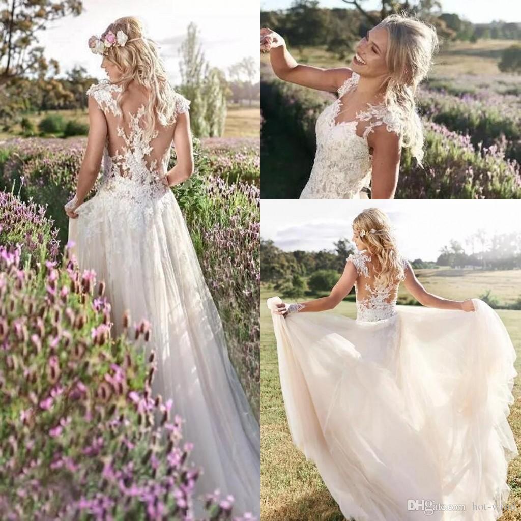 Elegant A-Line Bohemian Beach Wedding Dresses 2019 Cap Sleeves Illusion Bodices Lace Appliques Bridal Gowns Custom Made Sexy Back, White
Elegant A-Line Bohemian Beach Wedding Dresses 2019 Cap Sleeves Illusion Bodices Lace Appliques Bridal Gowns Custom Made Sexy Back, White