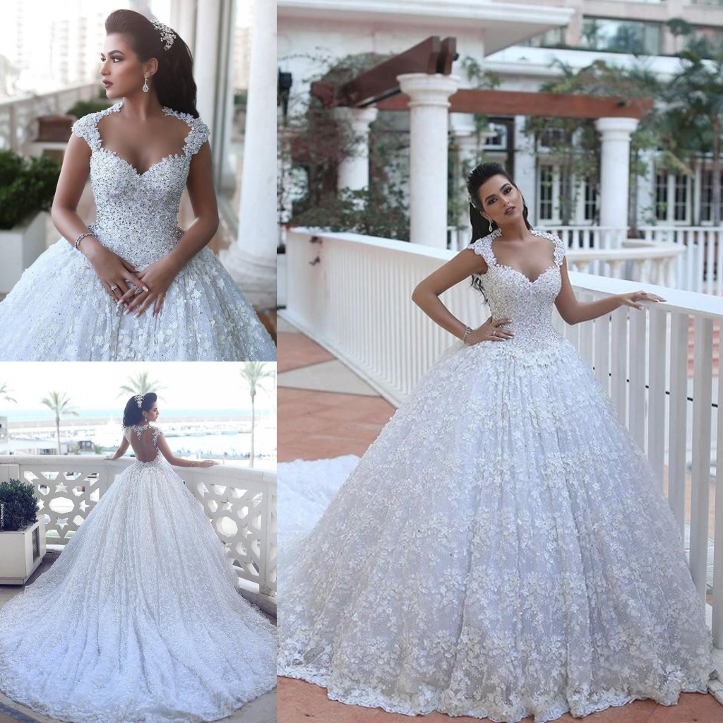 2018 Cheap Arabic Ball Gown Wedding Dresses Sweetheart Full Lace Beads Bling Cap Sleeves Court Train Backless Plus Size Formal Bridal Gowns, Ivory
2018 Cheap Arabic Ball Gown Wedding Dresses Sweetheart Full Lace Beads Bling Cap Sleeves Court Train Backless Plus Size Formal Bridal Gowns, Ivory