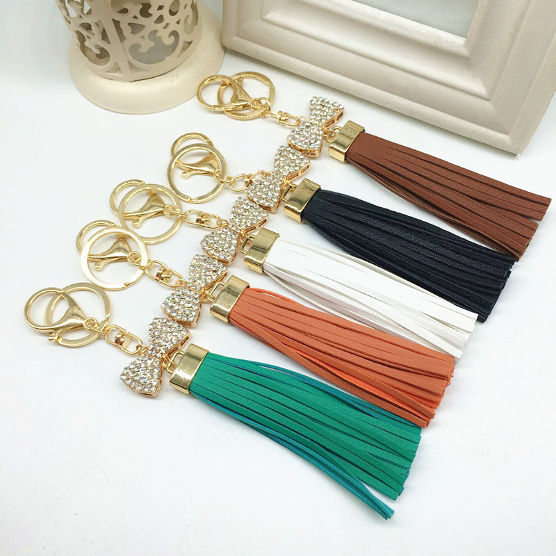 Luxurious Leather long Tassels Car Hanging With Bow Key Chains Alloy Key Ring Keychains Jewelry For Bags Car Phone Decoration
Luxurious Leather long Tassels Car Hanging With Bow Key Chains Alloy Key Ring Keychains Jewelry For Bags Car Phone Decoration