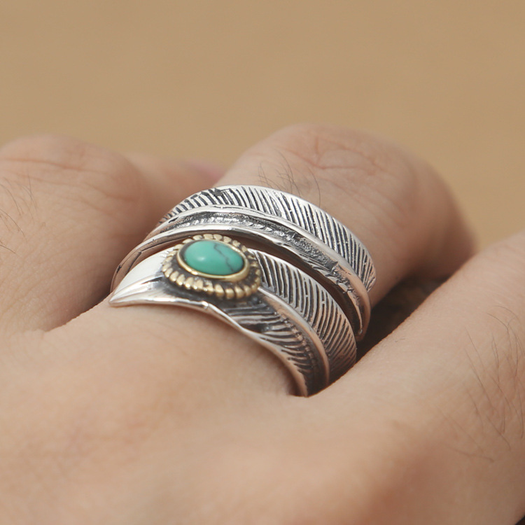 BRAND NEW 925 STERLING SILVER FASHION JEWELRY-STERLING SILVER FEATHER WITH TURQOISE SEMI PRECIOUS STONE IN BEZEL ADJUSTABLE OPOEN RING