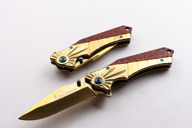 OEM Browning 368 Survival Tactical folding knife Gold coated Blade camping knives wtih retail paper box packing
OEM Browning 368 Survival Tactical folding knife Gold coated Blade camping knives wtih retail paper box packing