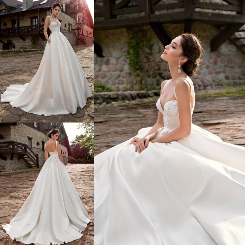 Gorgeous 2019 Satin Beach Wedding Dresses With Pockets Sleeveless Lace Appliques Country Bridal Gowns Spaghetti Strap Vestido De Novia, Same as image
Gorgeous 2019 Satin Beach Wedding Dresses With Pockets Sleeveless Lace Appliques Country Bridal Gowns Spaghetti Strap Vestido De Novia, Same as image