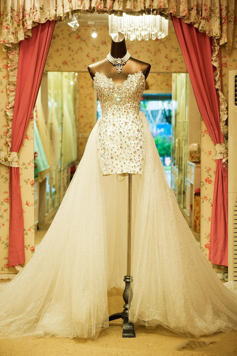 Sparkly Short Front Wedding Dress Long Back With Detachable Skirt New 2023 Sleeveless Hi Low Crystal Rhinestone Beaded Bow Beach Bridal Gowns