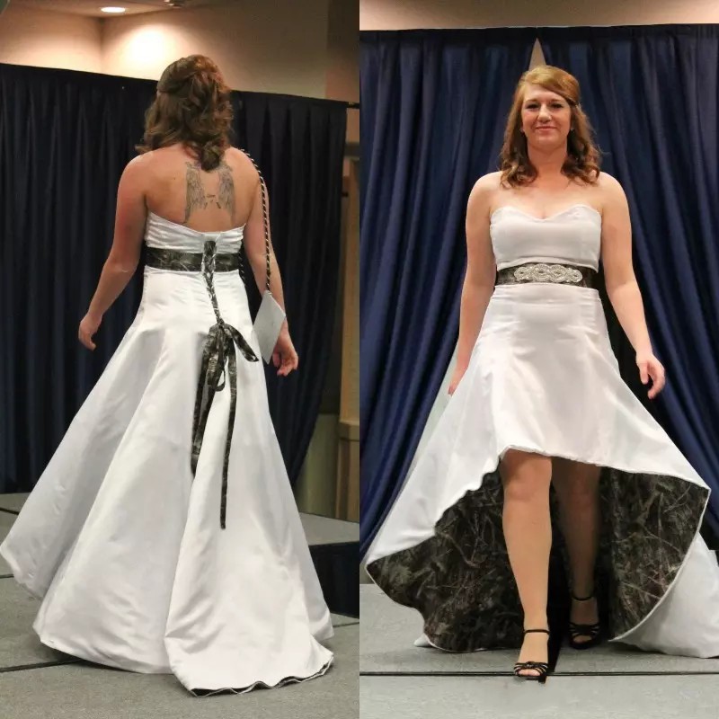2019 Strapless Hi-Lo Camo Wedding Dress A-Line Camo Wedding Gown with Sash and Sweep Train Bridal Dresses, Same as image
2019 Strapless Hi-Lo Camo Wedding Dress A-Line Camo Wedding Gown with Sash and Sweep Train Bridal Dresses, Same as image