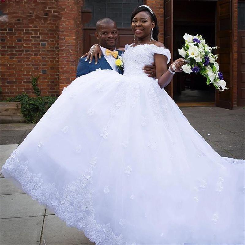 2018 African A Line Wedding Dresses Off Shoulder Lace Appliques Beaded 3D Floral Country Cathedral Train Black Girl Plus Size Bridal Gowns