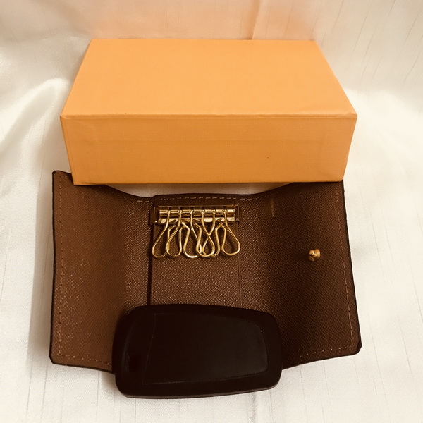 M60701 Luxury Designer 6 Key Holder Key Pouch France famous Mono Gram Canvers Brown White Checkered Key Ring, Brown letters
M60701 Luxury Designer 6 Key Holder Key Pouch France famous Mono Gram Canvers Brown White Checkered Key Ring, Brown letters