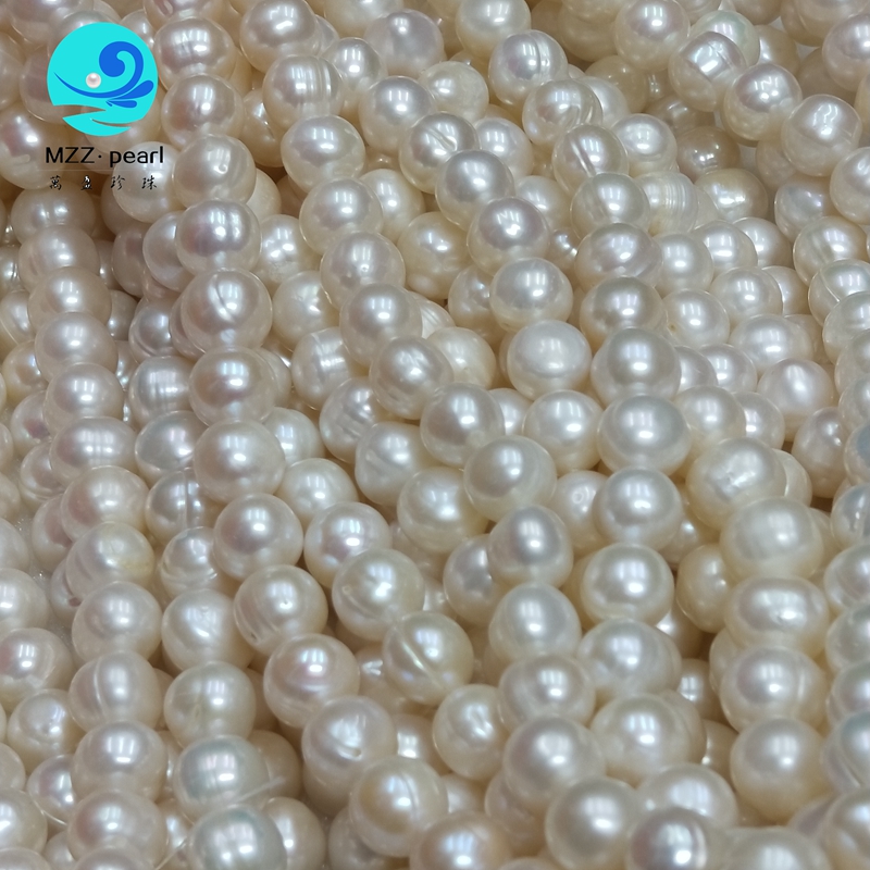 10-11mm big freshwater cultured pearl strands near round with ringes on pearl surface
10-11mm big freshwater cultured pearl strands near round with ringes on pearl surface