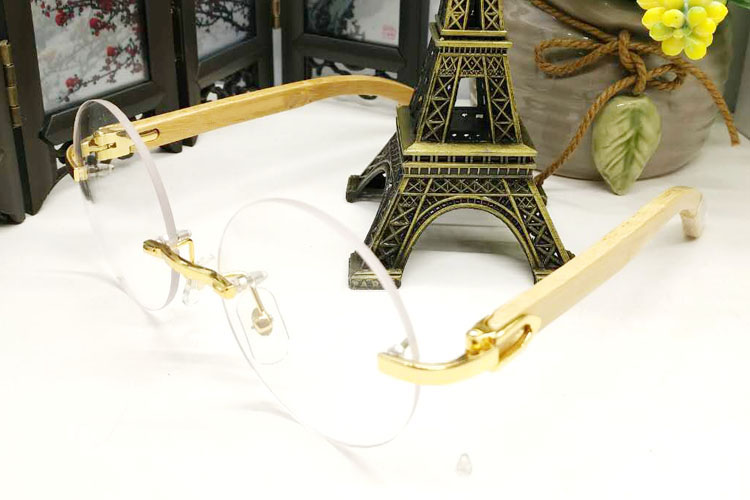 2018 rimless frame fashion brand buffalo horn glasses clear sunglasses for men women gold wood frame round circle lenses eyeglasses with box, White;black
2018 rimless frame fashion brand buffalo horn glasses clear sunglasses for men women gold wood frame round circle lenses eyeglasses with box, White;black