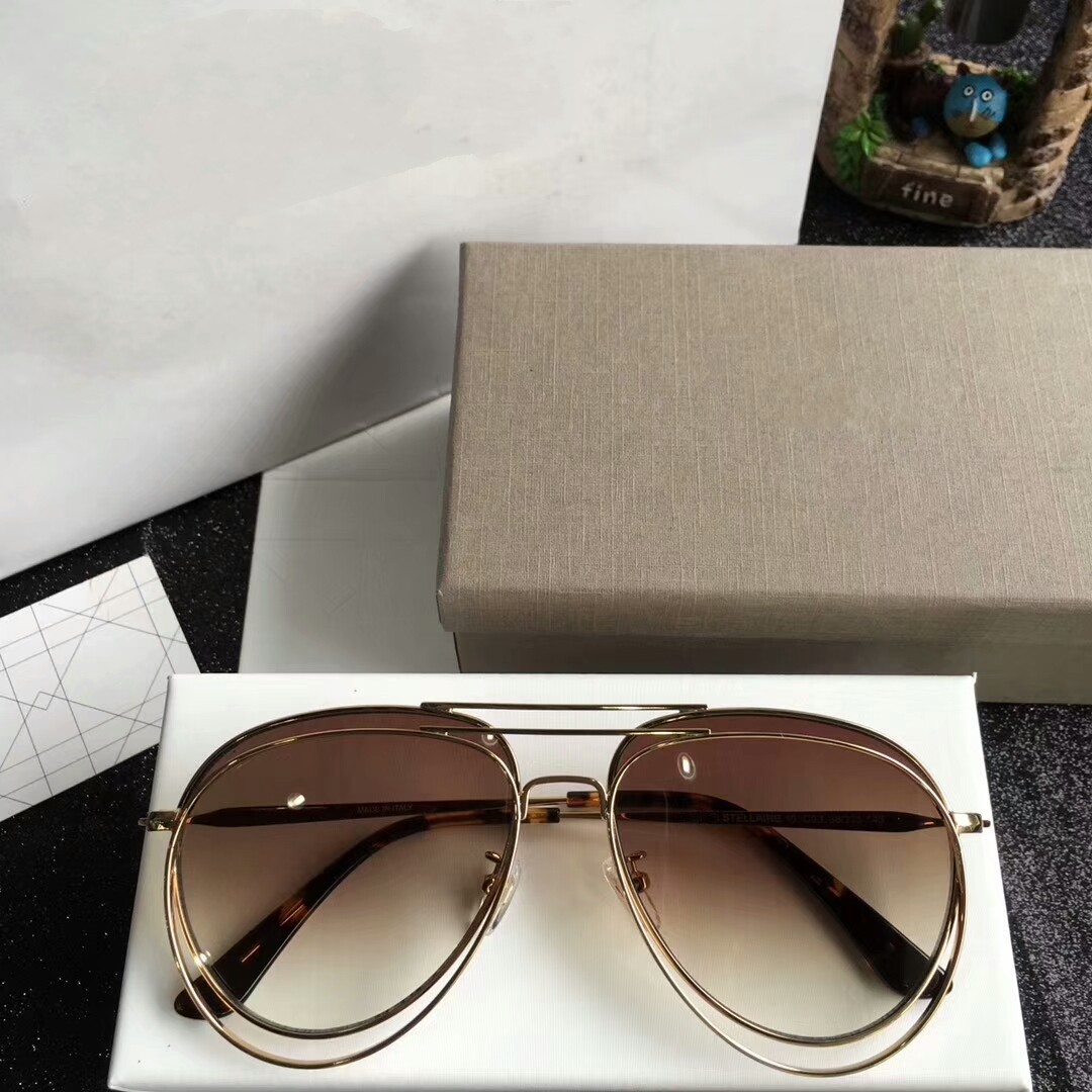 Latest selling popular fashion STELLAIRE women sunglasses mens sunglasses men sunglasses Gafas de sol top quality sun glasses UV400 lens
Latest selling popular fashion STELLAIRE women sunglasses mens sunglasses men sunglasses Gafas de sol top quality sun glasses UV400 lens