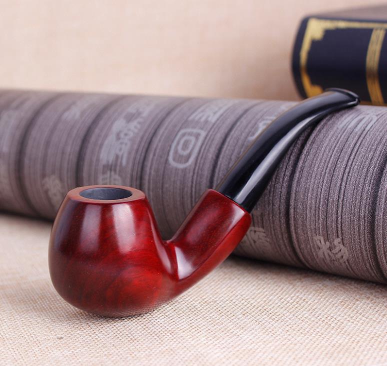 Creative new red sandalwood pipe, old hand grinding cigarette smoking accessories.
Creative new red sandalwood pipe, old hand grinding cigarette smoking accessories.