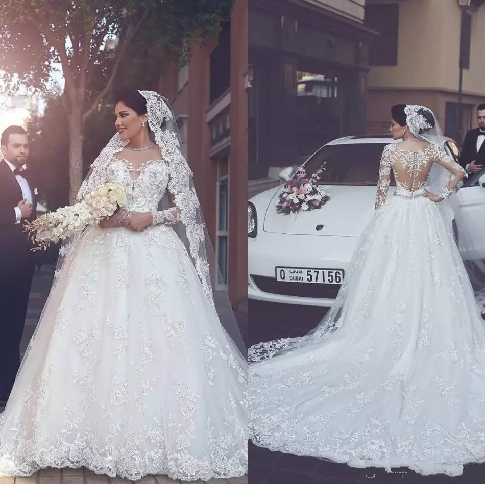 Luxury Ball Gown Wedding Dresses Lace Applique Beaded Sweep Train Dubai Arabic Country Bridal Dress Jewel Neck Plus Size Wedding Gowns