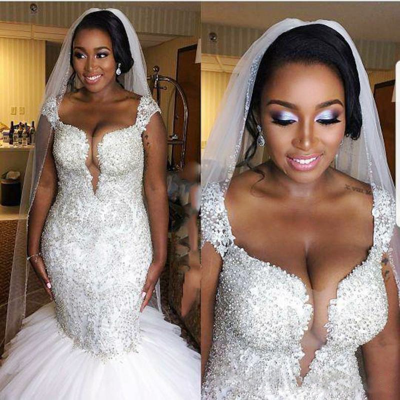 Shinning Beaded Wedding Dresses South African Front See Through Mermaid Bridal Gowns Tulle Tiered Sweep Train Wedding Vestidos Custom Made, Same as image
Shinning Beaded Wedding Dresses South African Front See Through Mermaid Bridal Gowns Tulle Tiered Sweep Train Wedding Vestidos Custom Made, Same as image