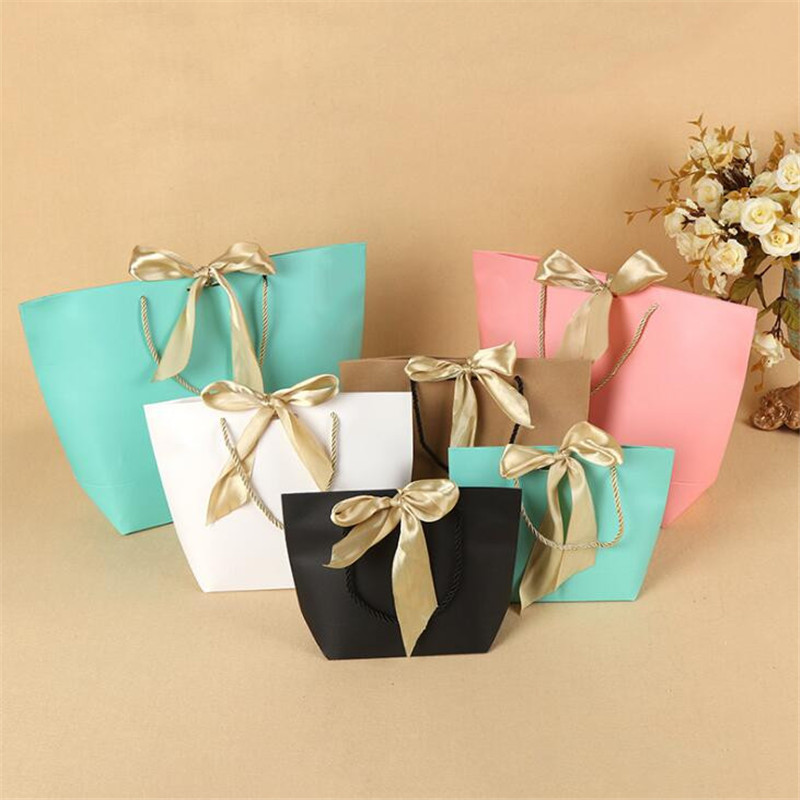 5 Colors Paper Gift Bag with Ribbon and Handle Children Clothing Packaging Shopping Bags 4 Sizes
5 Colors Paper Gift Bag with Ribbon and Handle Children Clothing Packaging Shopping Bags 4 Sizes