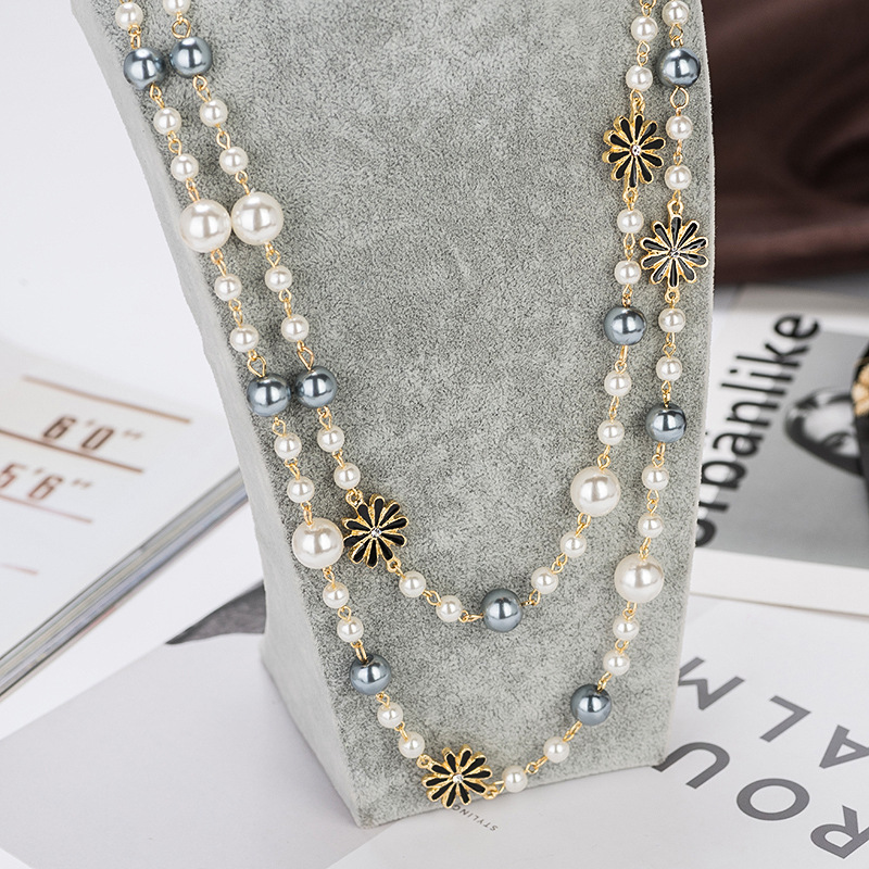Autumn winter flowers pearl sweater chain daisy flower pearl multi-layer long necklace clothing accessories hot temperament female jewelry
Autumn winter flowers pearl sweater chain daisy flower pearl multi-layer long necklace clothing accessories hot temperament female jewelry
