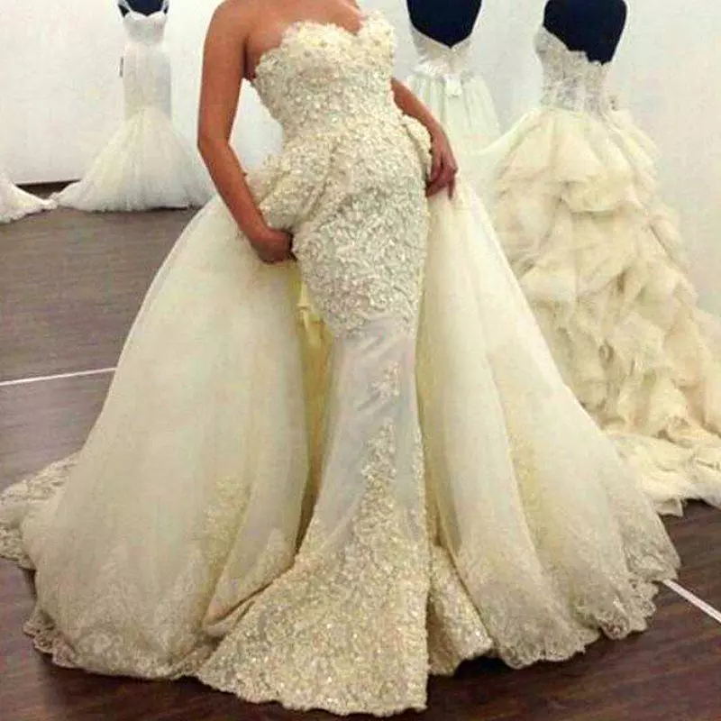 Fabulous Lace Appliqued Wedding Dresses With Overskirt Luxury Pearls Beaded Mermaid Tulle Wedding Gown Glamorous Dubai Sexy Bridal Dresses, Gold
Fabulous Lace Appliqued Wedding Dresses With Overskirt Luxury Pearls Beaded Mermaid Tulle Wedding Gown Glamorous Dubai Sexy Bridal Dresses, Gold