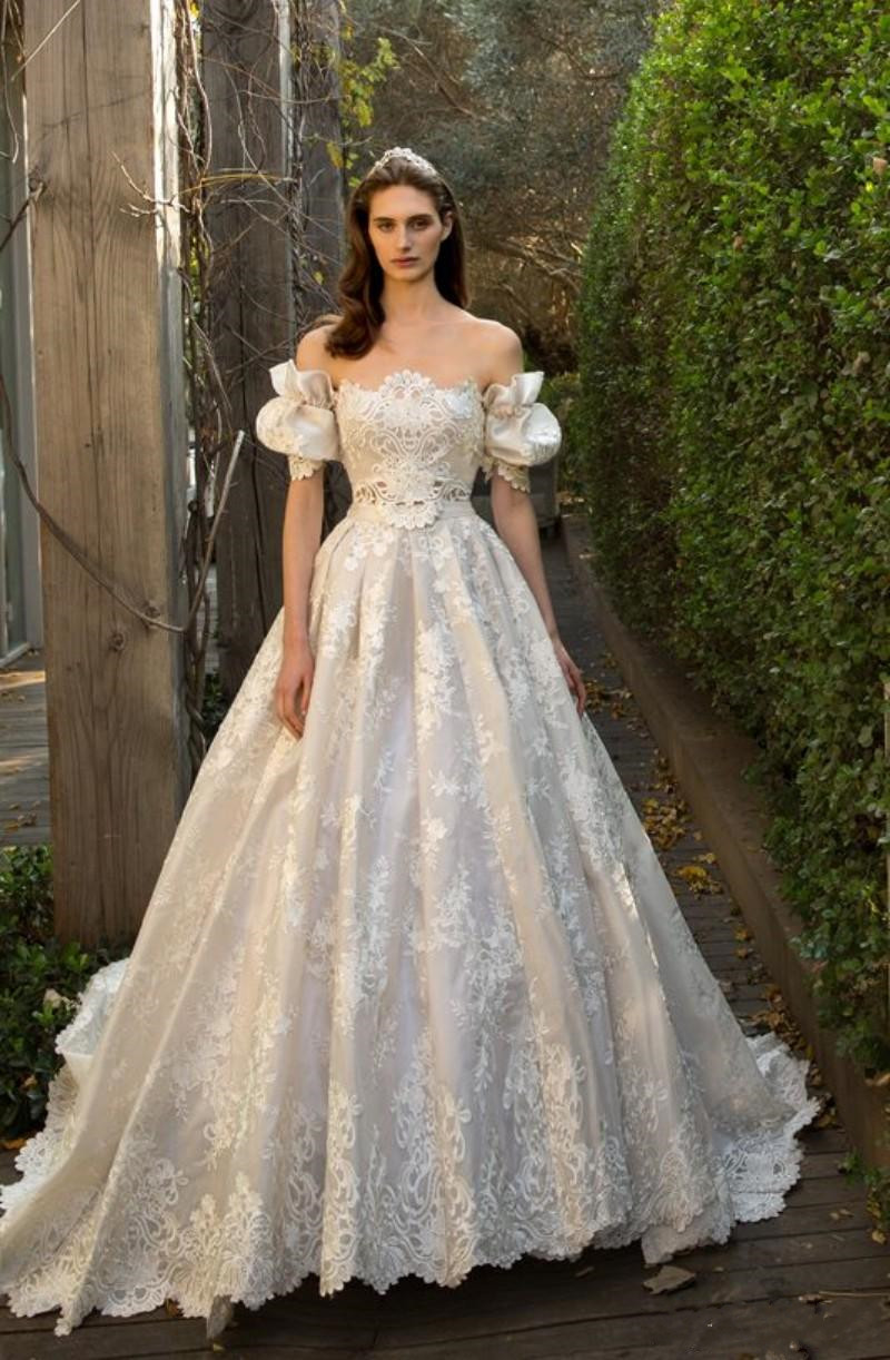 2020 New Vintage A-line Lace Applique Wedding Dresses With Puff Sleeves Off-Shoulder Neckline Chapel Train Illusion Bodice Bridal Gowns