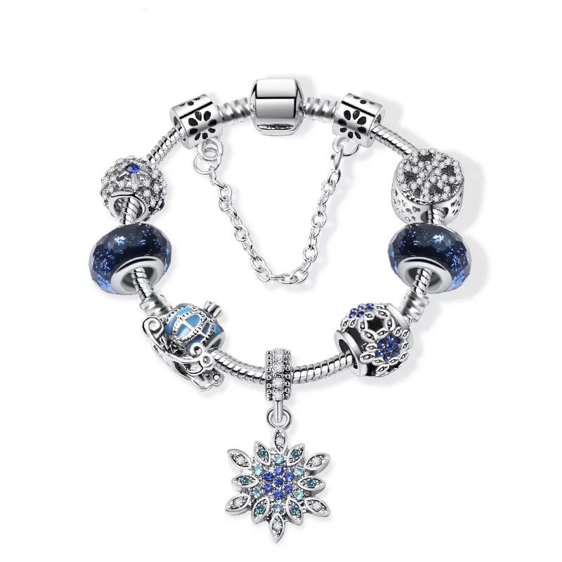 Elegant Blue Starry Night Charm Bracelet Adorned With Snowflakes and Halloween Pumkins Artisanal Glass Bead Jewelry