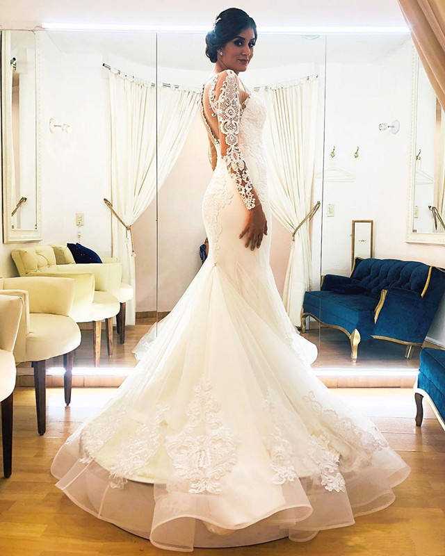 Illusion Long Sleeve Mermaid Wedding Dresses 2020 Sheer Jewel Neck Lace Applique Trumpet Sweep Train Aso Ebi Bride Wedding Gown