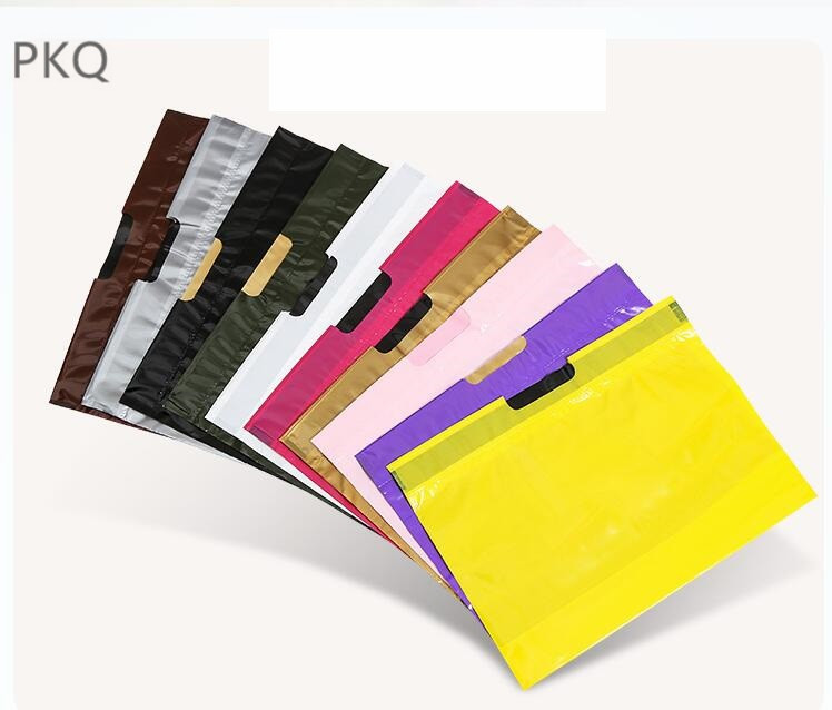 100pcs Plastic Gift Bag With Handles Personalized Clothing Shopping bags for packaging Large Size Storage Bag
100pcs Plastic Gift Bag With Handles Personalized Clothing Shopping bags for packaging Large Size Storage Bag