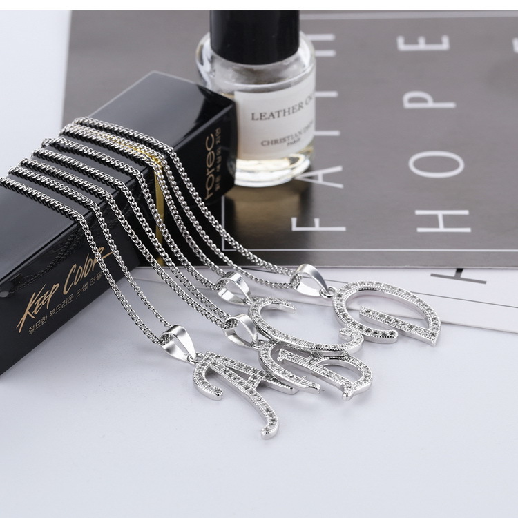 Wholesale- fashion luxury designer silver plated copper full diamond 24 Letters pendant necklace for women men
Wholesale- fashion luxury designer silver plated copper full diamond 24 Letters pendant necklace for women men