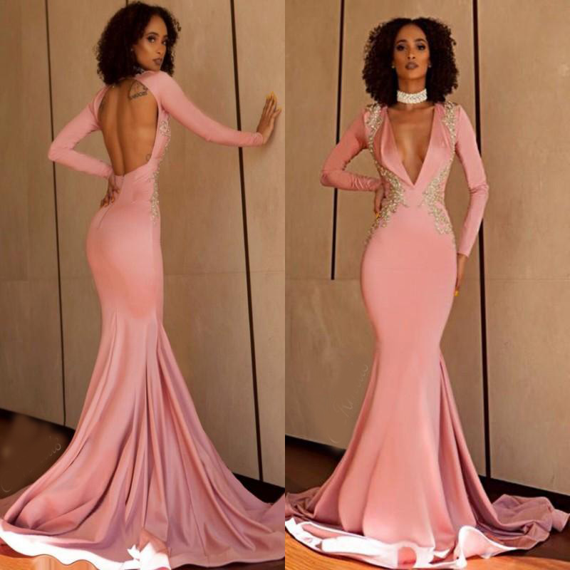2020 Beautiful Pink Mermaid Prom Dresses Sexy Keyhole Backless Long Sleeves with Gold Appliques Sweep Train Black Girls Evening Gowns .