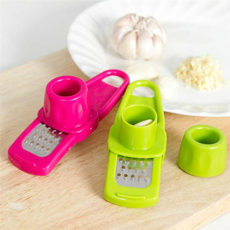 TY Kitchen Tools Household Creative Multifunction Ginger Grinder Garlic Cut Garlic Press
TY Kitchen Tools Household Creative Multifunction Ginger Grinder Garlic Cut Garlic Press