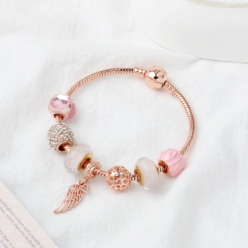 New Pandora 925 rose gold glaze magic beads bracelet angel wing pendant bracelet wholesale with box free shipping, Golden;silver
New Pandora 925 rose gold glaze magic beads bracelet angel wing pendant bracelet wholesale with box free shipping, Golden;silver