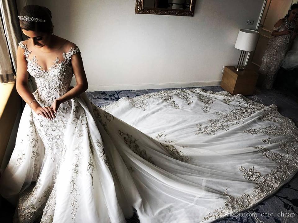 Gorgeous Beaded Lace Arabic Wedding Dresses With Detachable Train Sheer Neck Mermaid Bridal Dresses Tulle Vintage Sexy Wedding Gowns