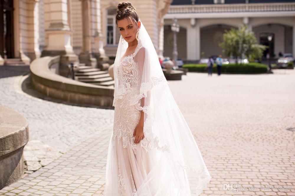 Lace New Stunning White Mermaid Wedding Dresses With Cape Sexy Sheer Button Covered Backless Floor Length Bridal Gowns Vestidos De Soiree